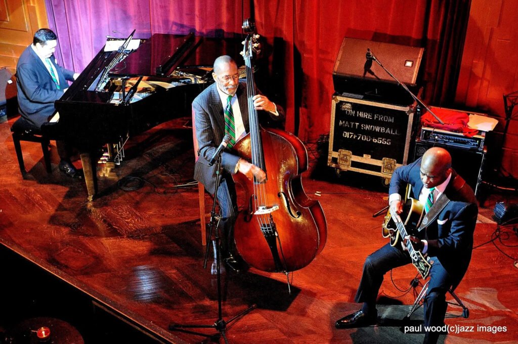 Remembering Russell Malone: A Jazz Guitarist’s Legacy 6 Russel Malone and the Golden striker Trio